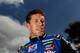 DAYTONA BEACH, FL - FEBRUARY 19: Carl Edwards, driver of the #99 Fastenal Ford, looks on after qualifying for the NASCAR Sprint Cup Series Daytona 500 at Daytona International Speedway on February 19, 2012 in Daytona Beach, Florida. (Photo by Tom Pennington/Getty Images for NASCAR)