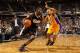 SACRAMENTO, CA - DECEMBER 26: Tyreke Evans #13 of the Sacramento Kings drives on Derek Fisher #2 of the Los Angeles Lakers at Power Balance Pavilion on December 26, 2011 in Sacramento, California. NOTE TO USER: User expressly acknowledges and agrees that, by downloading and or using this photograph, User is consenting to the terms and conditions of the Getty Images License Agreement. (Photo by Ezra Shaw/Getty Images)