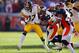 DENVER, CO - JANUARY 08: Mike Wallace #17 of the Pittsburgh Steelers runs with the ball after a catch against the Denver Broncos during the AFC Wild Card Playoff game at Sports Authority Field at Mile High on January 8, 2012 in Denver, Colorado. (Photo by Doug Pensinger/Getty Images)