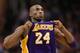 PHOENIX, AZ - FEBRUARY 19: Kobe Bryant #24 of the Los Angeles Lakers adjusts his jersey during the NBA game against the Phoenix Suns at US Airways Center on February 19, 2012 in Phoenix, Arizona. The Suns defeated the Lakers 102-90. NOTE TO USER: User expressly acknowledges and agrees that, by downloading and or using this photograph, User is consenting to the terms and conditions of the Getty Images License Agreement. (Photo by Christian Petersen/Getty Images)