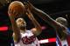 NEWARK, NJ - FEBRUARY 11: Tony Parker #9 of the San Antonio Spurs drives for a shot attempt against the New Jersey Nets at Prudential Center on February 11, 2012 in Newark, New Jersey. NOTE TO USER: User expressly acknowledges and agrees that, by downloading and or using this photograph, User is consenting to the terms and conditions of the Getty Images License Agreement. (Photo by Chris Chambers/Getty Images)