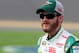 DAYTONA BEACH, FL - FEBRUARY 19: Dale Earnhardt Jr., driver of the #88 Diet Mountain Dew/National Guard Chevrolet, stands on the grid during qualifying for the NASCAR Sprint Cup Series Daytona 500 at Daytona International Speedway on February 19, 2012 in Daytona Beach, Florida. (Photo by Jerry Markland/Getty Images for NASCAR)