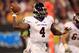 CHARLOTTE, NC - SEPTEMBER 03: Dominique Davis #4 of the East Carolina Pirates drops back to pass against the South Carolina Gamecocks during their game at Bank of America Stadium on September 3, 2011 in Charlotte, North Carolina. (Photo by Streeter Lecka/Getty Images)