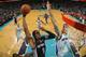 NEW ORLEANS, LA - JANUARY 18: Marreese Speights #5 of the Memphis Grizzlies shoots the ball over Jason Smith #14 of the New Orleans Hornets at New Orleans Arena on January 18, 2012 in New Orleans, Louisiana. NOTE TO USER: User expressly acknowledges and agrees that, by downloading and or using this photograph, User is consenting to the terms and conditions of the Getty Images License Agreement. (Photo by Chris Graythen/Getty Images)