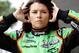HOMESTEAD, FL - NOVEMBER 18: Danica Patrick, driver of the #7 GoDaddy.com Chevrolet, walks in the garage area during practice for the NASCAR Nationwide Series Ford 300 at Homestead-Miami Speedway on November 18, 2011 in Homestead, Florida. (Photo by Todd Warshaw/Getty Images for NASCAR)