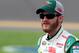 DAYTONA BEACH, FL - FEBRUARY 19: Dale Earnhardt Jr., driver of the #88 Diet Mountain Dew/National Guard Chevrolet, stands on the grid during qualifying for the NASCAR Sprint Cup Series Daytona 500 at Daytona International Speedway on February 19, 2012 in Daytona Beach, Florida. (Photo by Jerry Markland/Getty Images for NASCAR)