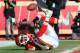 KANSAS CITY, MO - DECEMBER 24: Wide receiver Dwayne Bowe #82 of the Kansas City Chiefs drops a potential touchdown against the Oakland Raiders during the first half on December 24, 2011 at Arrowhead Stadium in Kansas City, Missouri. (Photo by Peter Aiken/Getty Images)
