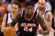 PHOENIX, AZ - FEBRUARY 15: Marvin Williams #24 of the Atlanta Hawks handles the ball during the NBA game against the Phoenix Suns at US Airways Center on February 15, 2012 in Phoenix, Arizona. The Hawks defeated the Suns 101-99. NOTE TO USER: User expressly acknowledges and agrees that, by downloading and or using this photograph, User is consenting to the terms and conditions of the Getty Images License Agreement. (Photo by Christian Petersen/Getty Images)
