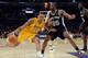 LOS ANGELES, CA - APRIL 12: Shannon Brown #12 of the Los Angeles Lakers dribbles on James Anderson #25 of the San Antonio Spurs during the game at Staples Center on April 12, 2011 in Los Angeles, California. NOTE TO USER: User expressly acknowledges and agrees that, by downloading and or using this photograph, User is consenting to the terms and conditions of the Getty Images License Agreement. (Photo by Harry How/Getty Images)