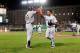 BALTIMORE, MD - SEPTEMBER 28: Mike Aviles #3 of the Boston Red Sox celebrates with Adrian Gonzalez #28 after scoring in the third inning against the Baltimore Orioles at Oriole Park at Camden Yards on September 28, 2011 in Baltimore, Maryland. (Photo by Greg Fiume/Getty Images)