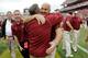 COLLEGE PARK, MD - SEPTEMBER 24: Head coach Steve Addazio (3R) of the Temple Owls hugs athletic director Bill Bradshaw after the Owls defeated the Maryland Terrapins 38-7 at Byrd Stadium on September 24, 2011 in College Park, Maryland. (Photo by Rob Carr/Getty Images)