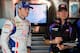 DAYTONA BEACH, FL - FEBRUARY 22: Kasey Kahne, driver of the #5 Farmers Insurance Chevrolet, stands with crew chief Kenny Francis in the garage during practice for the NASCAR Sprint Cup Series Daytona 500 at Daytona International Speedway on February 22, 2012 in Daytona Beach, Florida. (Photo by Todd Warshaw/Getty Images for NASCAR)