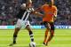 WOLVERHAMPTON, ENGLAND - OCTOBER 01: Gabriel Obertan of Newcastle and Karl Henry of Wolverhampton challenge for the ball during the Barclays Premier League match between Wolverhampton Wanderers and Newcastle United at Molineux on October 1, 2011 in Wolverhampton, England. (Photo by Matthew Lewis/Getty Images)