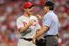 ST LOUIS, MO - OCTOBER 05: Roy Oswalt #44 of the Philadelphia Phillies talks with home plate umpire Angel Hernandez after a squirrel ran across home in the fifth inning against the St. Louis Cardinals in Game Four of the National League Division Series at Busch Stadium on October 5, 2011 in St Louis, Missouri. (Photo by Jamie Squire/Getty Images)
