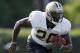METAIRIE, LA - AUGUST 03: Joique Bell #20 of the New Orleans Saints runs a play during practice at the New Orleans Saints training facility on August 3, 2011 in Metairie, Louisiana. (Photo by Chris Graythen/Getty Images)