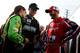 DAYTONA BEACH, FL - FEBRUARY 24: (L-R) Danica Patrick, driver of the #7 GoDaddy.com Chevrolet, speaks to Trevor Bayne, driver of the #60 Roush Fenway Racing Ford, and Dale Earnhardt Jr., driver of the #5 TaxSlayer.com Chevrolet, prior to winning the Coors Light Pole Award and qualifying for the pole position for the NASCAR Nationwide Series DRIVE4COPD 300 at Daytona International Speedway on February 24, 2012 in Daytona Beach, Florida. (Photo by Tom Pennington/Getty Images for NASCAR)
