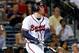 ATLANTA, GA - SEPTEMBER 12: Freddie Freeman #5 of the Atlanta Braves hits a deep pop fly that scores Michael Bourn #24 in the fifth inning against the Florida Marlins at Turner Field on September 12, 2011 in Atlanta, Georgia. (Photo by Kevin C. Cox/Getty Images)