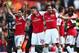 LONDON, ENGLAND - FEBRUARY 26: (L-R) Mikel Arteta, Carl Jenkinson and Robin van Persie of Arsenal celebrate after the Barclays Premier League match between Arsenal and Tottenham Hotspur at Emirates Stadium on February 26, 2012 in London, England. (Photo by Clive Mason/Getty Images)