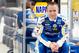 DAYTONA BEACH, FL - FEBRUARY 22: Mark Martin, driver of the #55 Aaron's Toyota, sits behind the team hauler in the garage area during practice for the NASCAR Sprint Cup Series Daytona 500 at Daytona International Speedway on February 22, 2012 in Daytona Beach, Florida. (Photo by Todd Warshaw/Getty Images for NASCAR)