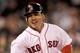 BOSTON, MA - SEPTEMBER 19: Jacoby Ellsbury #2 of the Boston Red Sox reacts after he crossed home for an inside the park home against the Baltimore Orioles defends in the seventh inning during the second game of a doubleheader at Fenway Park September 19, 2011 in Boston, Massachusetts. (Photo by Jim Rogash/Getty Images)