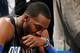 ATLANTA, GA - APRIL 28: Dwight Howard #12 of the Orlando Magic sits on the bench during a timeout before the final seconds against the Atlanta Hawks during Game Six of the Eastern Conference Quarterfinals in the 2011 NBA Playoffs at Philips Arena on April 28, 2011 in Atlanta, Georgia. NOTE TO USER: User expressly acknowledges and agrees that, by downloading and or using this photograph, User is consenting to the terms and conditions of the Getty Images License Agreement. (Photo by Kevin C. Cox/Getty Images)