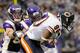 MINNEAPOLIS, MN - JANUARY 1: Chad Greenway #52 and Asher Allen #21 of the Minnesota Vikings look to tackle Earl Bennett #80 of the Chicago Bears during the fourth quarter on January 1, 2012 at Mall of America Field at the Hubert H. Humphrey Metrodome in Minneapolis, Minnesota. The Bears defeated the Vikings 17-13. (Photo by Hannah Foslien/Getty Images)