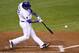 KANSAS CITY, MO - SEPTEMBER 20: Salvador Perez #13 of the Kansas City Royals hits a RBI single in the fourth inning during a game against the Detroit Tigers at Kauffman Stadium on September 20, 2011 in Kansas City, Missouri. (Photo by Ed Zurga/Getty Images)