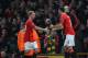 MANCHESTER, ENGLAND - JANUARY 14: Paul Scholes of Manchester United shakes hands with Ryan Giggs as he is substituted during the Barclays Premier League match between Manchester United and Bolton Wanderers at Old Trafford on January 14, 2012 in Manchester, England. (Photo by Alex Livesey/Getty Images)