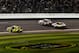 DAYTONA BEACH, FL - FEBRUARY 27: Matt Kenseth, driver of the #17 Best Buy Ford, leads Dale Earnhardt Jr., driver of the #88 Diet Mountain Dew/National Guard Chevrolet, and Greg Biffle, driver of the #16 3M Ford, on the final lap of the NASCAR Sprint Cup Series Daytona 500 at Daytona International Speedway on February 27, 2012 in Daytona Beach, Florida. (Photo by Streeter Lecka/Getty Images)