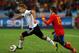 DURBAN, SOUTH AFRICA - JULY 07: Lukas Podolski of Germany is closed down by Sergio Ramos of Spain during the 2010 FIFA World Cup South Africa Semi Final match between Germany and Spain at Durban Stadium on July 7, 2010 in Durban, South Africa. (Photo by Clive Rose/Getty Images)