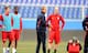 GENOA, ITALY - FEBRUARY 28: USA head coach Jurgen Klinsmann (center L) and Michael Bradley (centre R) look on as players warm up during a training session ahead of their international friendly against Italy at Luigi Ferraris Stadium on February 28, 2012 in Genoa, Italy. (Photo by Claudio Villa/Getty Images)