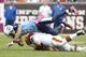 CLEVELAND, OH - OCTOBER 02: Cornerback Cortland Finnegan #31 of the Tennessee Titans hits quarterback Colt McCoy #12 of the Cleveland Browns at Cleveland Browns Stadium on October 2, 2011 in Cleveland, Ohio. (Photo by Matt Sullivan/Getty Images)