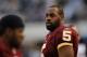 ARLINGTON, TX - DECEMBER 19: Quarterback Donovan McNabb #5 of the Washington Redskins on the sidelines against play against the Dallas Cowboys at Cowboys Stadium on December 19, 2010 in Arlington, Texas. (Photo by Ronald Martinez/Getty Images)