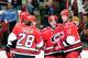 RALEIGH, NC - JANUARY 10: Jerome Samson #71 of the Carolina Hurricanes cekebrates with teammates after scoring his first NHL goal against the Philadelphia Flyers during play at the RBC Center on January 10, 2012 in Raleigh, North Carolina. (Photo by Grant Halverson/Getty Images)