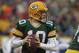 GREEN BAY, WI - JANUARY 01: Matt Flynn #10 of the Green Bay Packerslooks for a receiver as Ndamukong Suh #90 of the Detroit Lions rushes at Lambeau Field on January 1, 2012 in Green Bay, Wisconsin. The Packers defeated the Lions 45-41. (Photo by Jonathan Daniel/Getty Images)