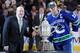 VANCOUVER, CANADA - MAY 24: NHL Deputy Commissioner Bill Daly and Captain Henrik Sedin #33 of the Vancouver Canucks pose with the Clarence Campbell Bowl after the Vancouver Canucks defeated the San Jose Sharks 3-2 in double-overtime in Game Five to win the Western Conference Finals series 4-1 during the 2011 Stanley Cup Playoffs at Rogers Arena on May 24, 2011 in Vancouver, British Columbia, Canada. Bieksa got the game-winning goal in the second overtime to win the series 4-1. (Photo by Harry How/Getty Images)