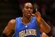 EAST RUTHERFORD, NJ - NOVEMBER 16: Dwight Howard #12 of the Orlando Magic celebrates a basket against the New Jersey Nets during their game at the Izod Center on November 16, 2007 in East Rutherford, New Jersey.The Magic defeated the Nets 95-70. NOTE TO USER: User expressly acknowledges and agrees that, by downloading and/or using this Photograph, User is consenting to the terms and conditions of the Getty Images License Agreement. (Photo by Jim McIsaac/Getty Images)
