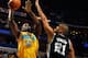 NEW ORLEANS, LA - JANUARY 22: Emeka Okafor #50 of the New Orleans Hornets shoots the ball over Tim Duncan #21 of the San Antonio Spurs at the New Orleans Arena on January 22, 2011 in New Orleans, Louisiana. NOTE TO USER: User expressly acknowledges and agrees that, by downloading and/or using this photograph, User is consenting to the terms and conditions of the Getty Images License Agreement. (Photo by Chris Graythen/Getty Images)