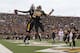 COLUMBIA, MO - NOVEMBER 13: Michael Egnew #82 of the Missouri Tigers congratulates Jerrell Jackson #29 with a chest bump after Jackson carried for a touchdown during the game against the Kansas State Wildcats on November 13, 2010 at Faurot Field/Memorial Stadium in Columbia, Missouri. (Photo by Jamie Squire/Getty Images)