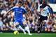LONDON, ENGLAND - FEBRUARY 25: Gary Cahill (L) of Chelsea holds off David Ngog (R) of Bolton Wanderers during the Barclays Premier League match between Chelsea and Bolton Wanderers at Stamford Bridge on February 25, 2012 in London, England. (Photo by Clive Mason/Getty Images)