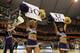 SYRACUSE, NY - MARCH 25: Cheerleaders for the Washington Huskies perform against the West Virginia Mountaineers during the east regional semifinal of the 2010 NCAA men's basketball tournament at the Carrier Dome on March 25, 2010 in Syracuse, New York. (Photo by Jim McIsaac/Getty Images)