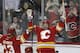 CALGARY, CANADA - NOVEMBER 18: Curtis Glencross #20 of the Calgary Flames celebrates his second goal of the game with teammate Olli Jokinen #13 of the Chicago Blackhawks in third-period NHL action on November 18, 2011 at the Scotiabank Saddledome in Calgary, Alberta, Canada. (Photo by Mike Ridewood/Getty Images)