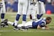 INDIANAPOLIS - OCTOBER 22: Peyton Manning #18 of the Indianapolis Colts lost his helmet after getting hit while he threw a pass during the NFL game against the Washington Redskins on October 22, 2006 at the RCA Dome in Indianapolis, Indiana. The Colts won 36-22. (Photo by Andy Lyons/Getty Images)