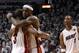 MIAMI, FL - MAY 31: LeBron James #6 and Dwyane Wade #3 of the Miami Heat hug alongside teammate Chris Bosh #1 of the Miami Heat after the Heat defeat the Dallas Mavericks 92-84 in Game One of the 2011 NBA Finals at American Airlines Arena on May 31, 2011 in Miami, Florida. NOTE TO USER: User expressly acknowledges and agrees that, by downloading and/or using this Photograph, user is consenting to the terms and conditions of the Getty Images License Agreement. (Photo by Mike Ehrmann/Getty Images)