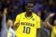 CHARLOTTE, NC - MARCH 20: Tim Hardaway Jr. #10 of the Michigan Wolverines reacts after making a three-pointer in the second half while taking on the Duke Blue Devils during the third round of the 2011 NCAA men's basketball tournament at Time Warner Cable Arena on March 20, 2011 in Charlotte, North Carolina. (Photo by Streeter Lecka/Getty Images)