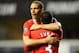 LONDON, ENGLAND - MARCH 04: Rio Ferdinand of Manchester United hugs teammate Patrice Evra after victory in the Barclays Premier League match between Tottenham Hotspur and Manchester United at White Hart Lane on March 4, 2012 in London, England. (Photo by Mike Hewitt/Getty Images)