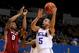 LOS ANGELES, CA - MARCH 01: Jerime Anderson #5 of the UCLA Bruins foes up for a shot over Marcus Capers #0 of the Washington State Cougars at the LA Sports Arena on March 1, 2012 in Los Angeles, California. UCLA won 78-46. (Photo by Stephen Dunn/Getty Images)