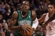 BOSTON, MA - JANUARY 16: Rajon Rondo #9 of the Boston Celtics heads for the net as Russell Westbrook #0 of the Oklahoma City Thunder defends on January 16, 2012 at TD Garden in Boston, Massachusetts. NOTE TO USER: User expressly acknowledges and agrees that, by downloading and or using this photograph, User is consenting to the terms and conditions of the Getty Images License Agreement. (Photo by Elsa/Getty Images)