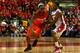 NEW BRUNSWICK, NJ - FEBRUARY 19: Scoop Jardine #11 of the Syracuse Orange drives against Jerome Seagears #1 of the Rutgers Scarlet Knights at Louis Brown Athletic Center on February 19, 2012 in New Brunswick, New Jersey. (Photo by Chris Chambers/Getty Images)