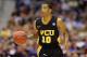 Darius Theus scored 16 points to give VCU their second CAA Tournament Championship.